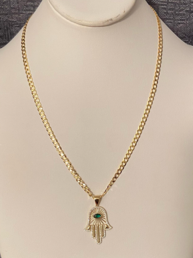 Chain in Gold, paired with a Hamsa Hand (Hand of Fatima) pendant.